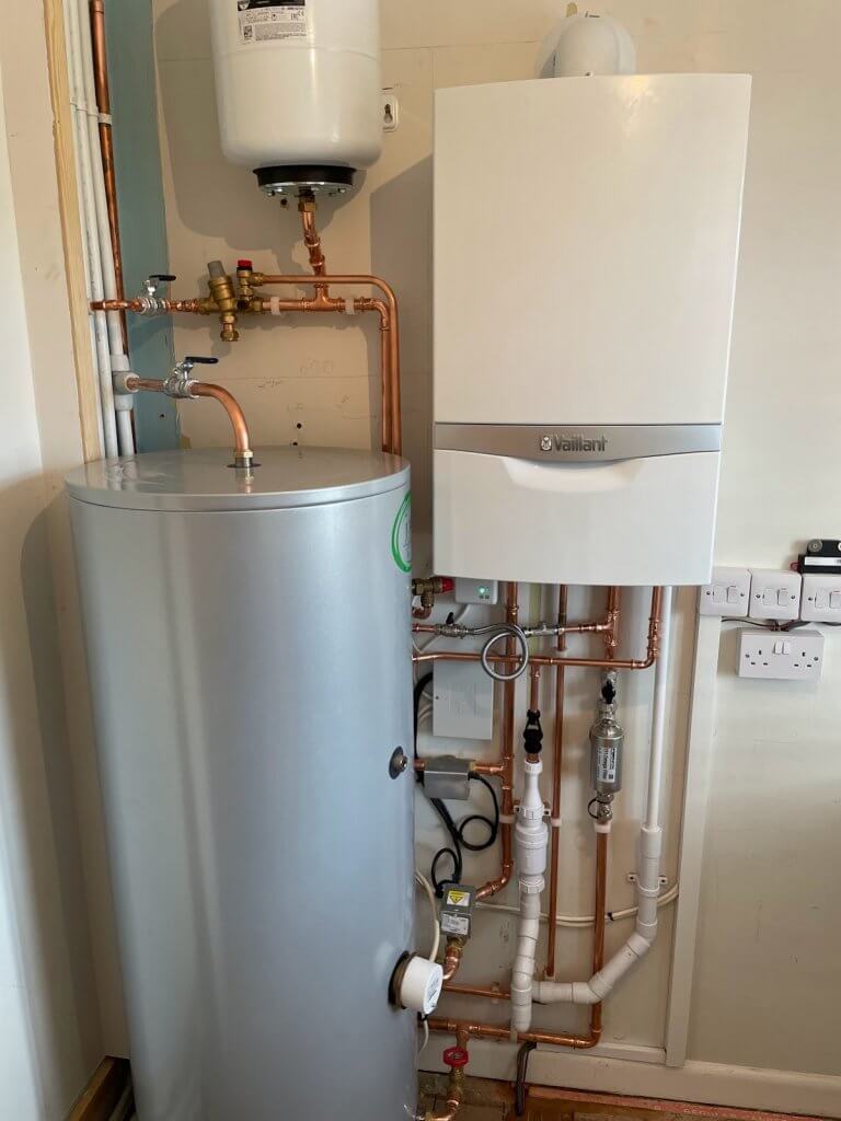 A Vaillant boiler and unvented cylinder installed by Lee, with tidy copper pipework